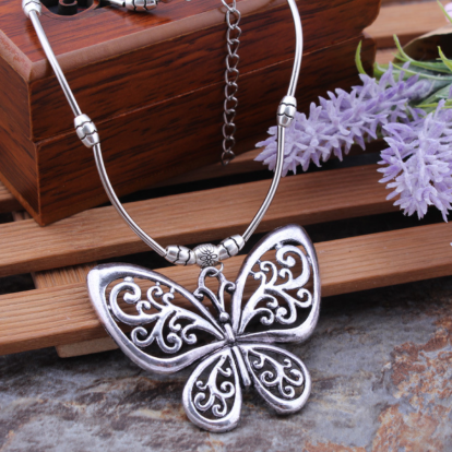 Carved openwork butterfly pendant