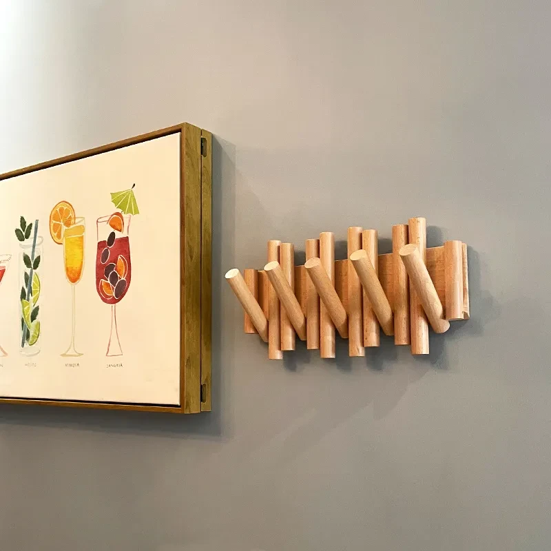 Solid Wood Punch-Free Seamless Folding Clothes Rack with Strong Glue & Creative Row Hook