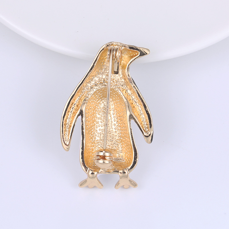 Penguin pin corsage