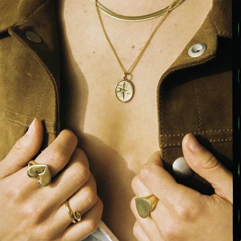 Make a statement with the Creative Hip Hop Fashion Heart-shaped Gold and Silver Color Ring. This bold, eye-catching piece combines modern design with a touch of elegance, perfect for those who love to stand out.