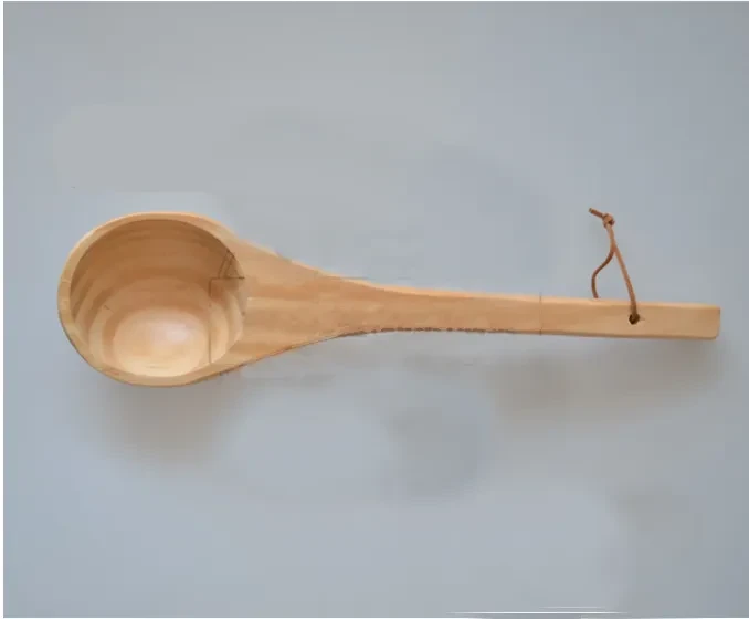 Wooden barrel and wooden spoon