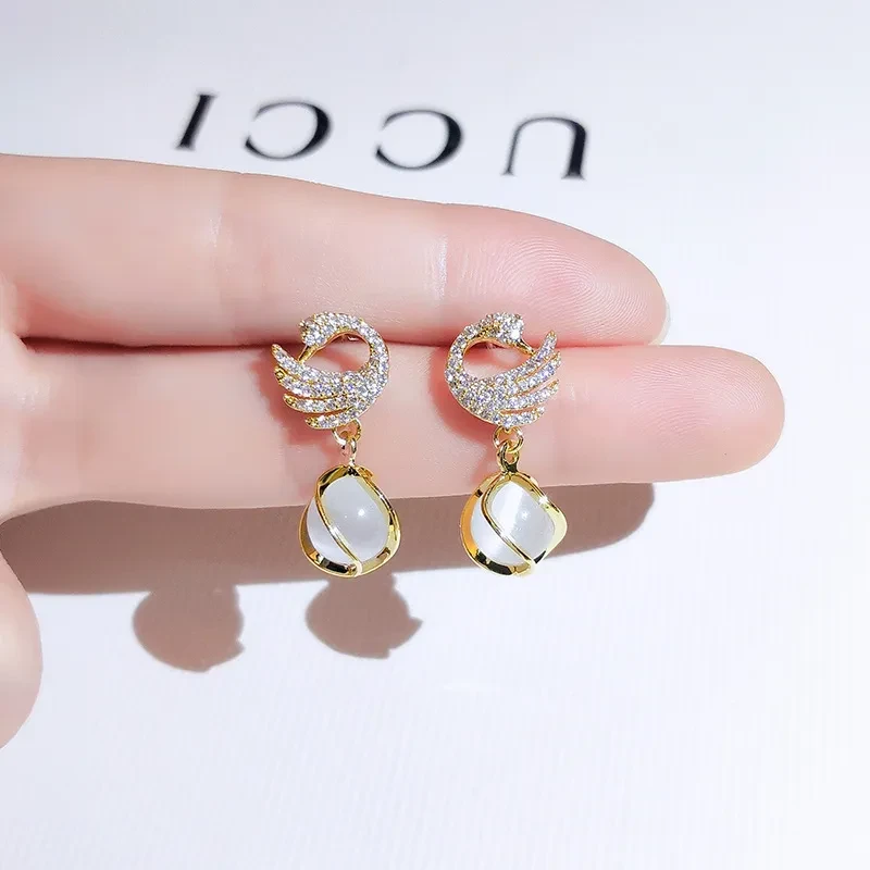 Elegant Swan Crystal Drop Earrings with Gold Accents