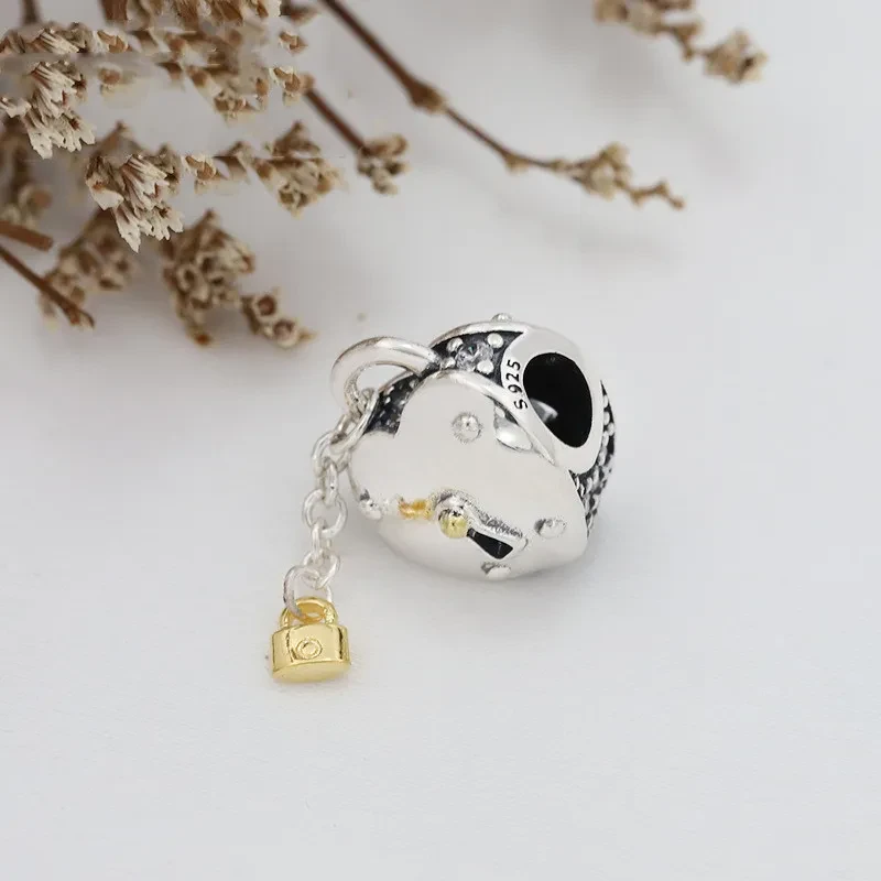 Gold love tassel pendant