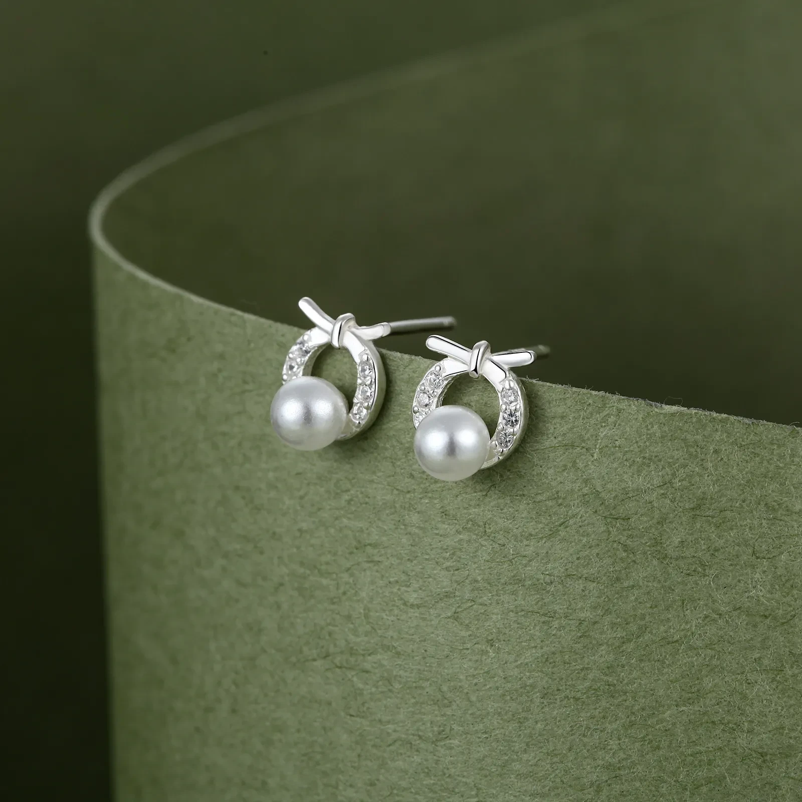 Women's Hollow S999 Sterling Silver Round Bow Stud Earrings