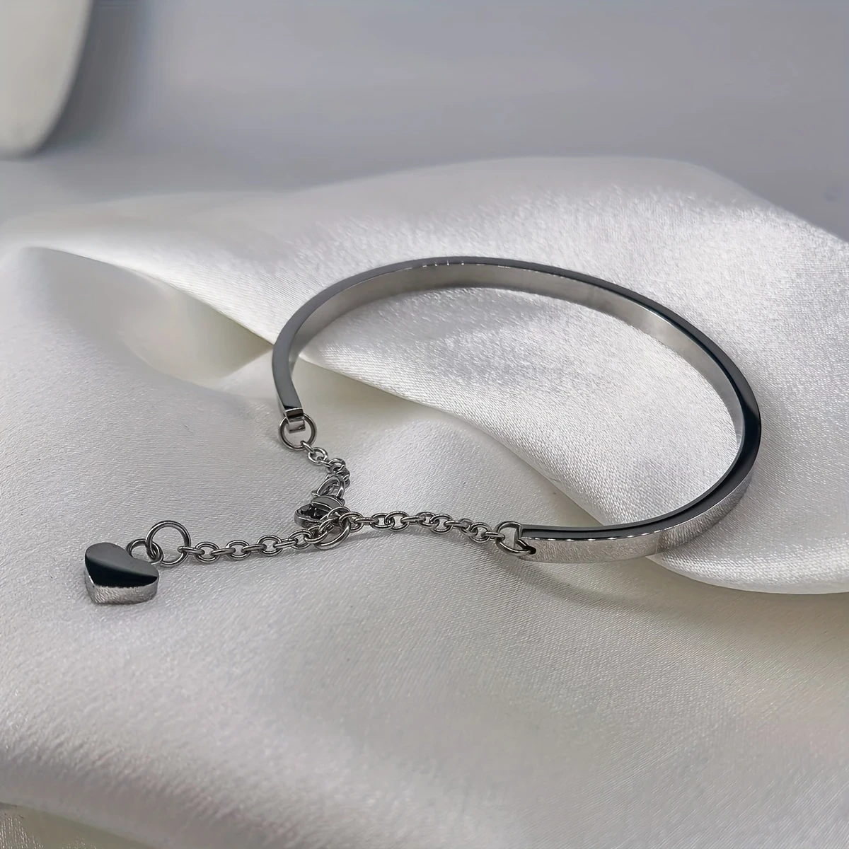 Golden-Plated Stainless Steel Heart Pendant Bracelet with Chain Extension  Unisex Fashion Accessory for Men and Women, Perfect for Couples or Casual Attire