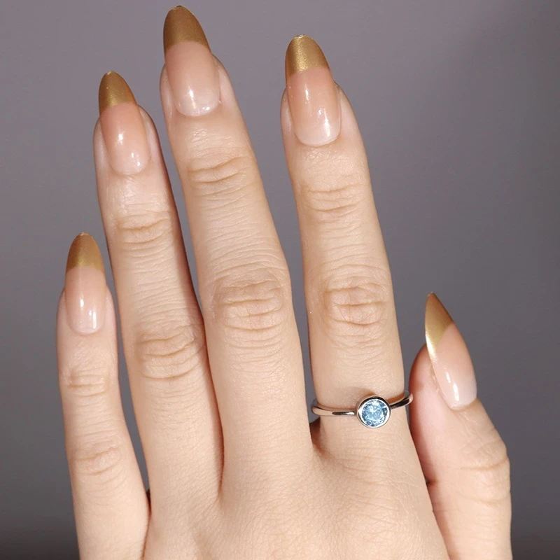 Sterling Silvery Charm Ring with Sparkling Blue Zirconia  Elegant Design for Women, Perfect for Daily Wear and Special Occasions