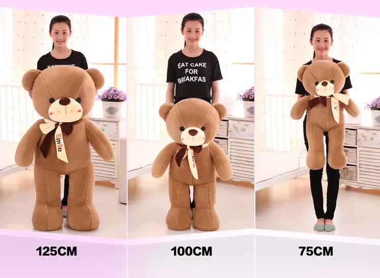 Smiling scarf teddy bear doll