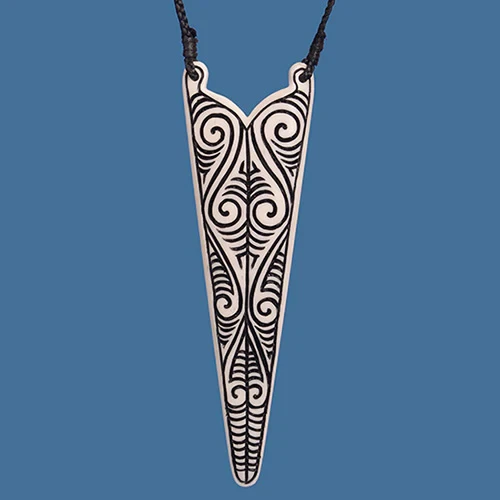 Bone Pendant with T Moko Inspired Pattern