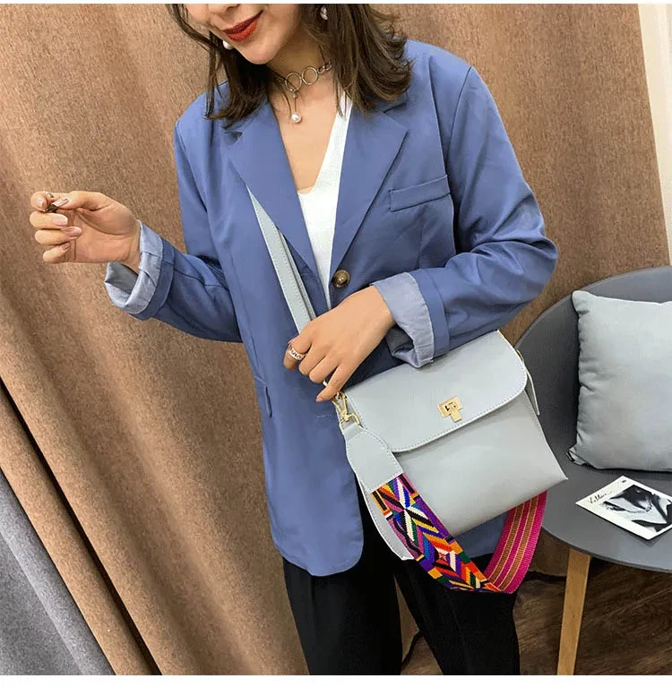 One shoulder crossbody wide shoulder strap crossbody bag