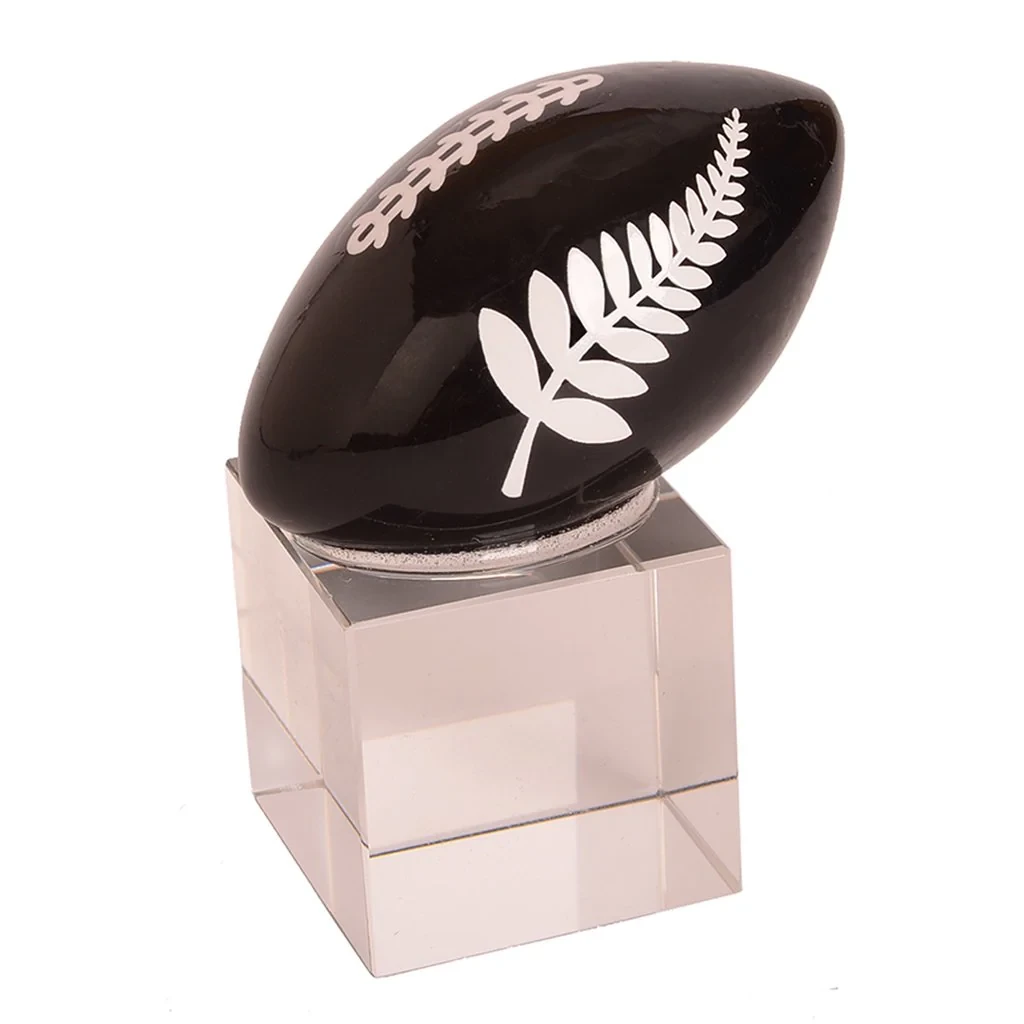 Glass Black Rugby Ball with Fern on Stand